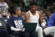 Gregory Jackson #45 of the Memphis Grizzlies reviews film with former Memphis Grizzlies Assistant coach Sonia Raman - Source: Getty